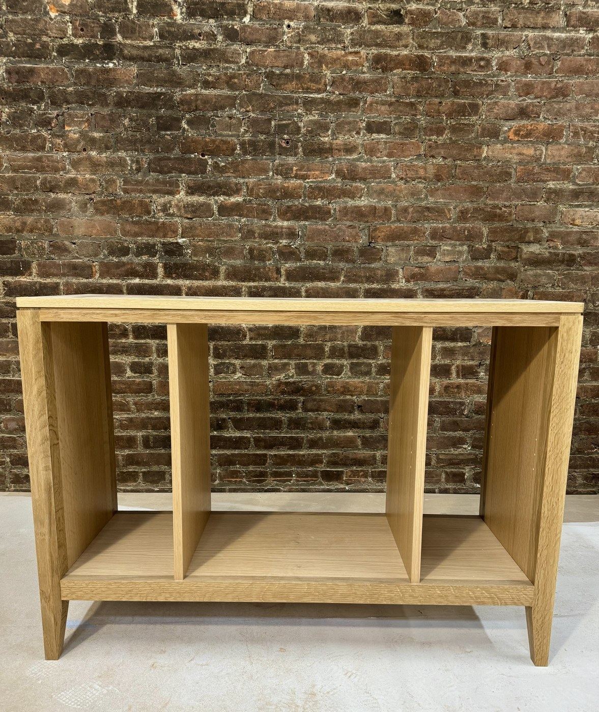 White oak console with three open bays