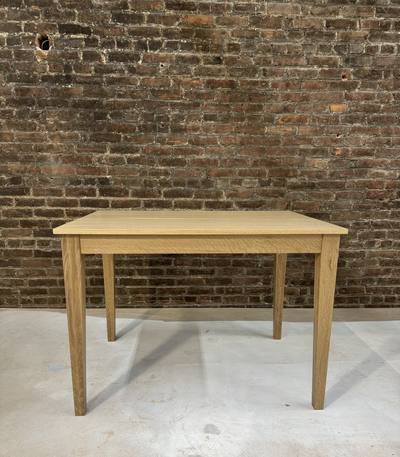 Solid white oak dining table with tapered legs